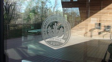 LEED Gold certification on glass door of the Trinity River Audubon Center