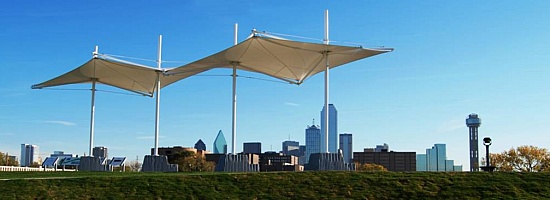 Panoramic view of the Trinity Overlook Park with architectural shade structures. This park gives visitors to the area a closeup view of the Dallas Floodway with signage explaining the proposed Trinity Lakes region