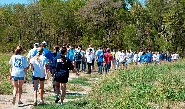 volunteers walking through the great trinity forest